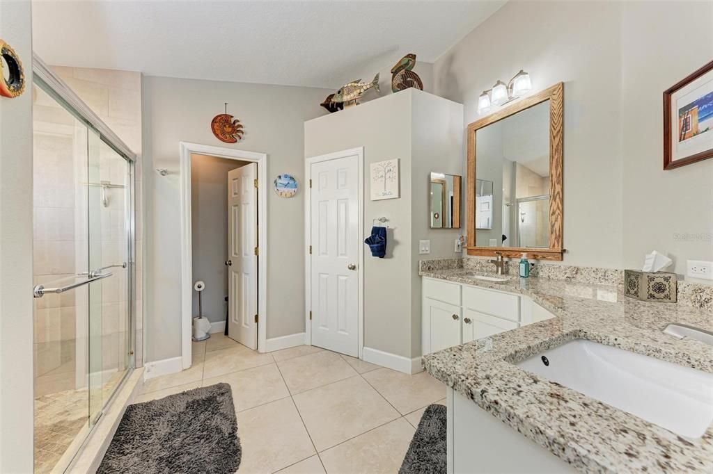 Primary bath - redone and stunning!  Great space, granite counters, refaced cabinets, new hardware and accessories!