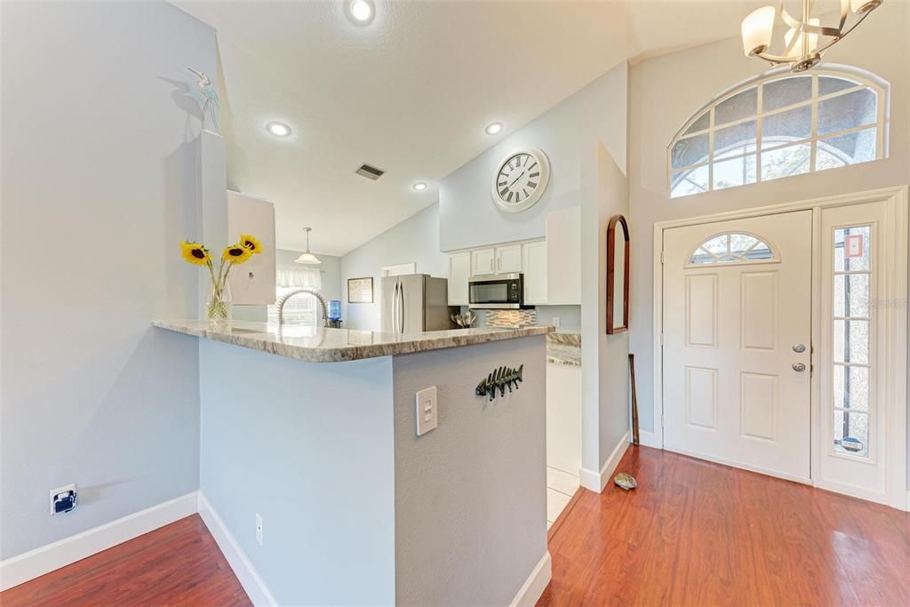 Kitchen w/new granite counters, refaced cabinets and new appliances!