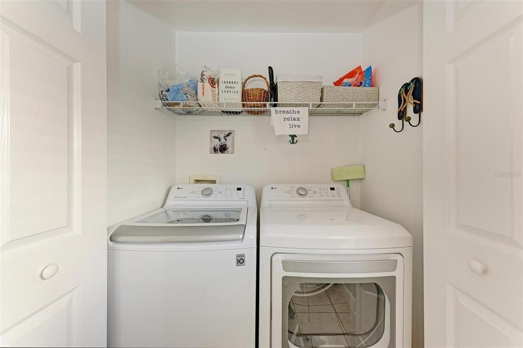 Washer and dryer in closet in kitchen