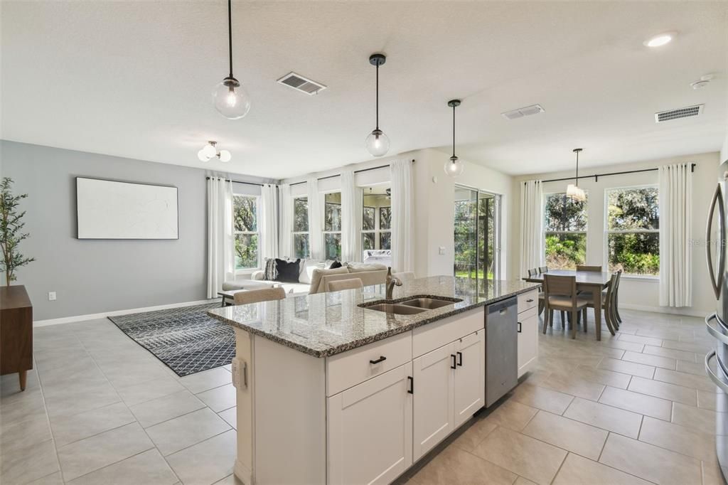 The kitchen overlooks both the living room and dining room.