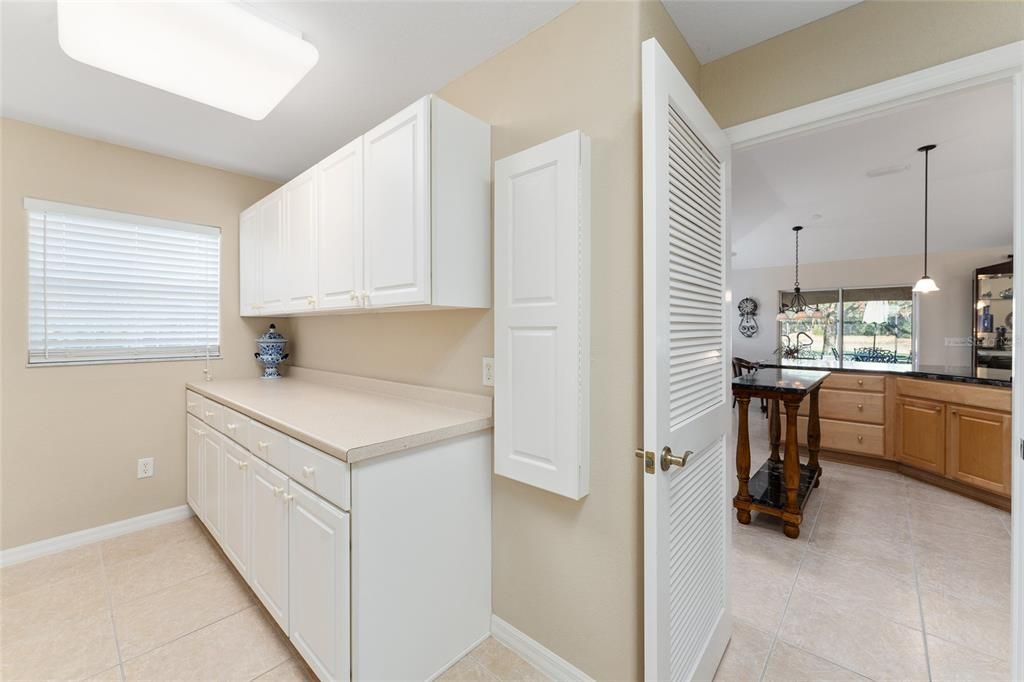 LAUNDRY ROOMBUTLER'S PANTRY W/ IRONING BOARD CABINET