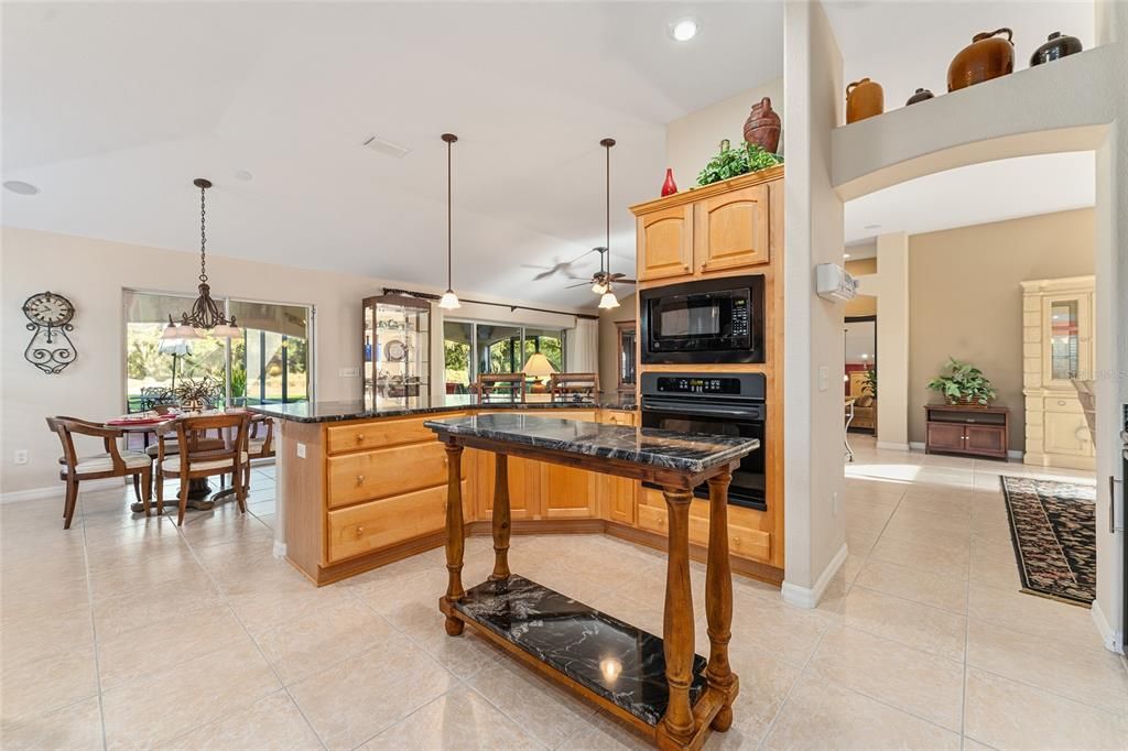 KITCHEN VIEW TO KITCHENETTE AREA AND LANAI