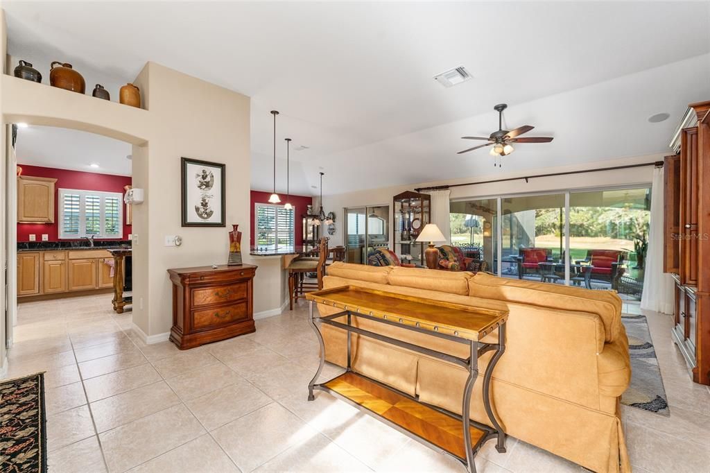 VIEW TO KITCHEN AND FAMILY ROOM AND LANAI