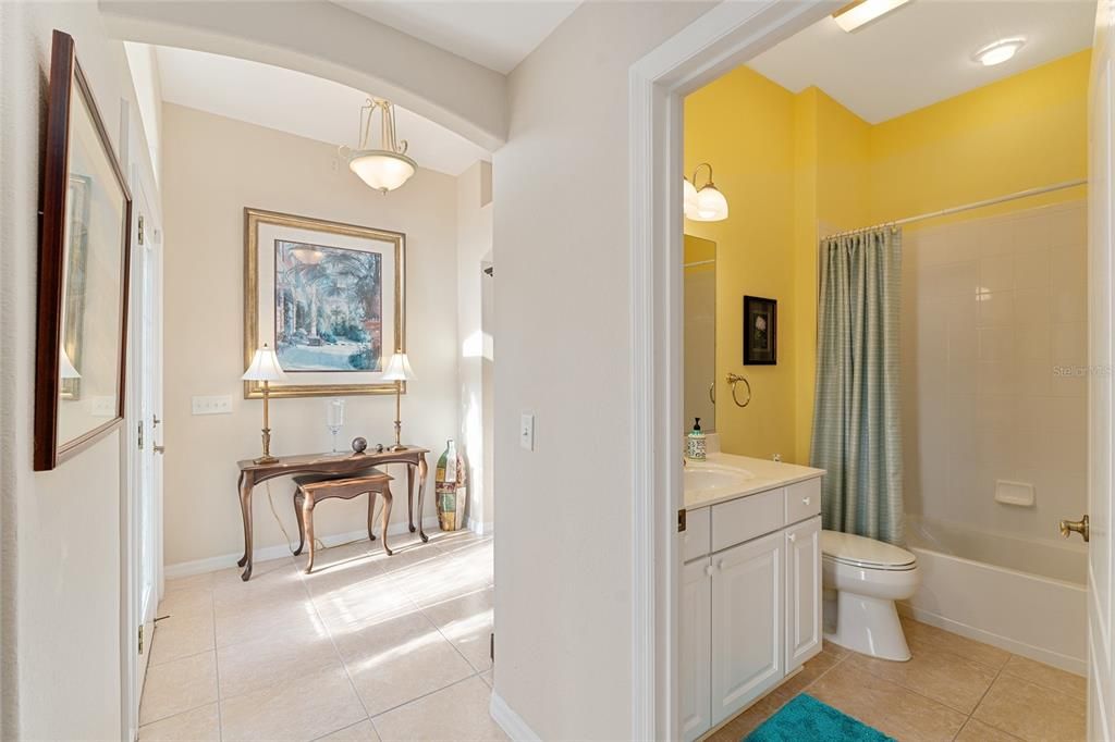 FOYER AND GUEST BATHROOM VIEW