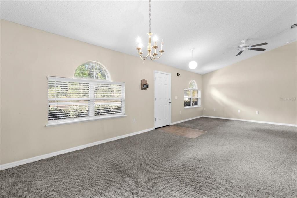 Formal Living Room & Dining Room are Separated from the Family Space