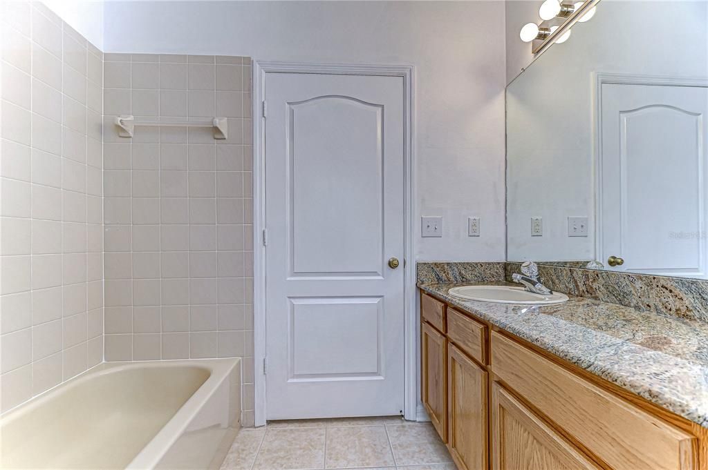 guest bathroom w bath-tub