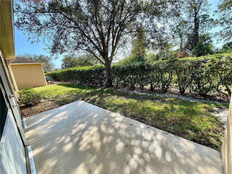 Natural fence along with a metal fence around the community allowing privacy and safety