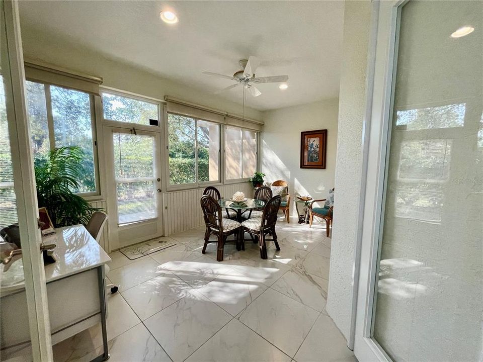 Enclosed lanai has french doors from the kitchen.