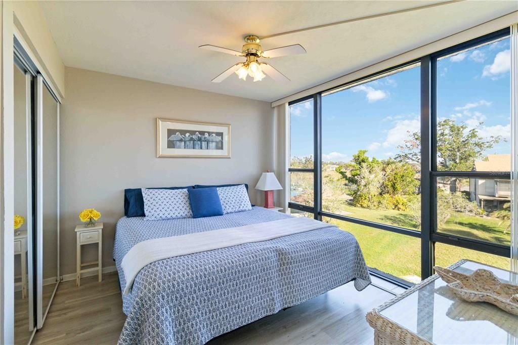 Primary bedroom with amazing windows!