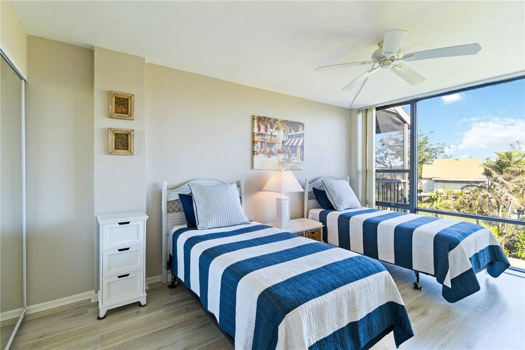 Guest Bedroom with amazing wall of windows!