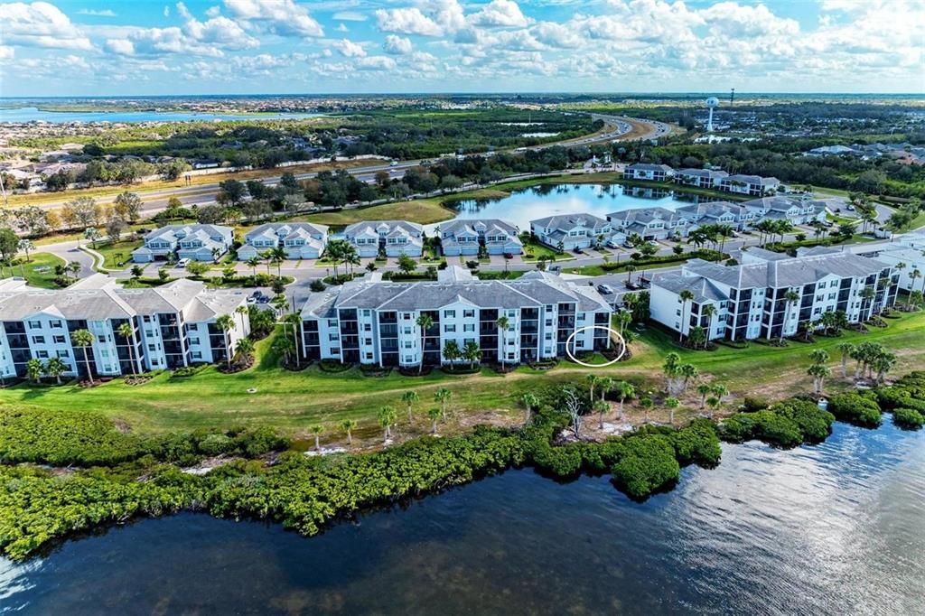 View of the condos from the Manatee River. #101 is circled