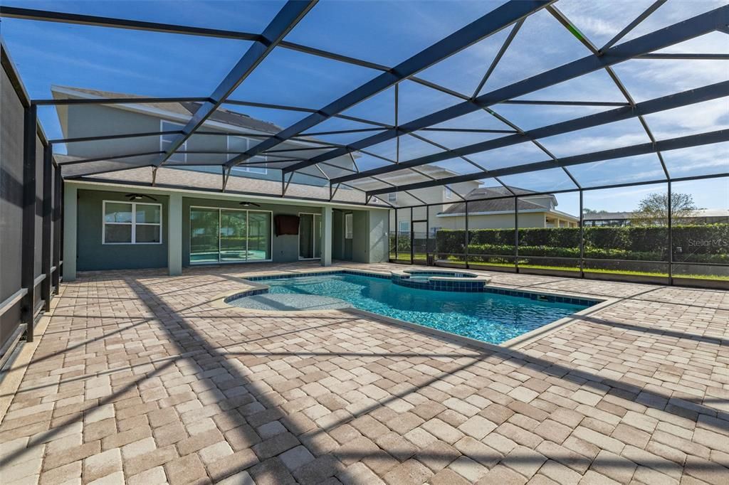 Extended Paved Pool Deck with Cage