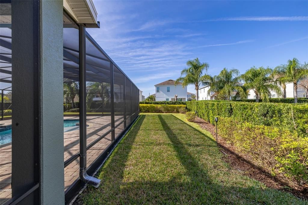 Large fenced backyard and side yard