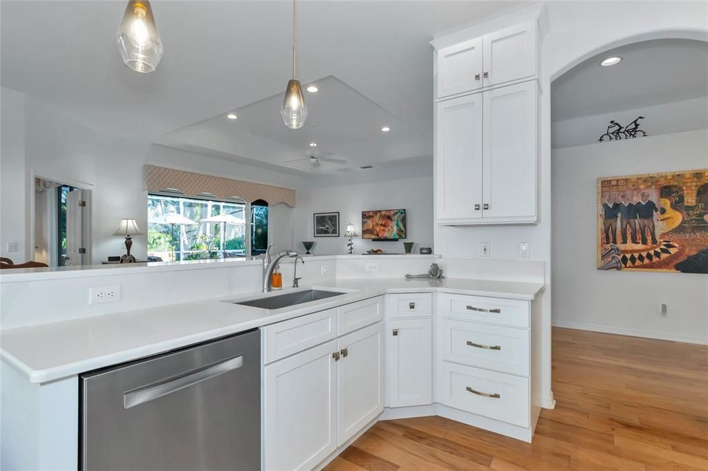 Quartz countertop and deep single stainless steel sink w/reverse osmosis sink tap.