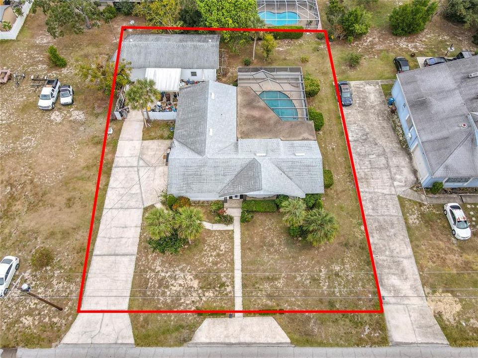 Aerial view of the home and pool area