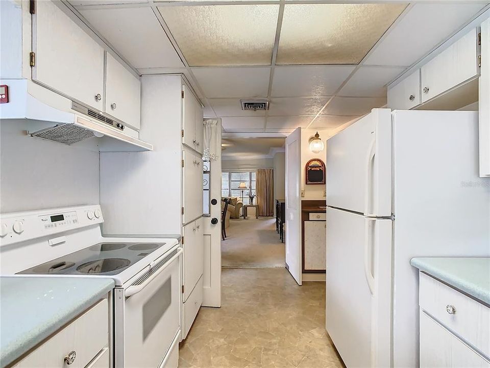 Kitchen has a door that leads to the dining room which can be closed when having dinner parties