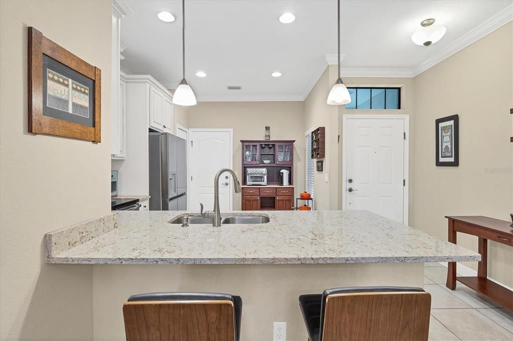 OPEN KITCHEN WITH STONE COUNTERS