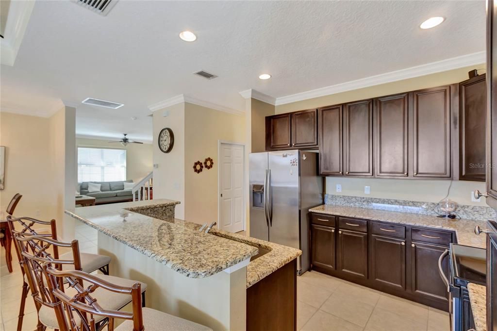 Kitchen island with a high top bar