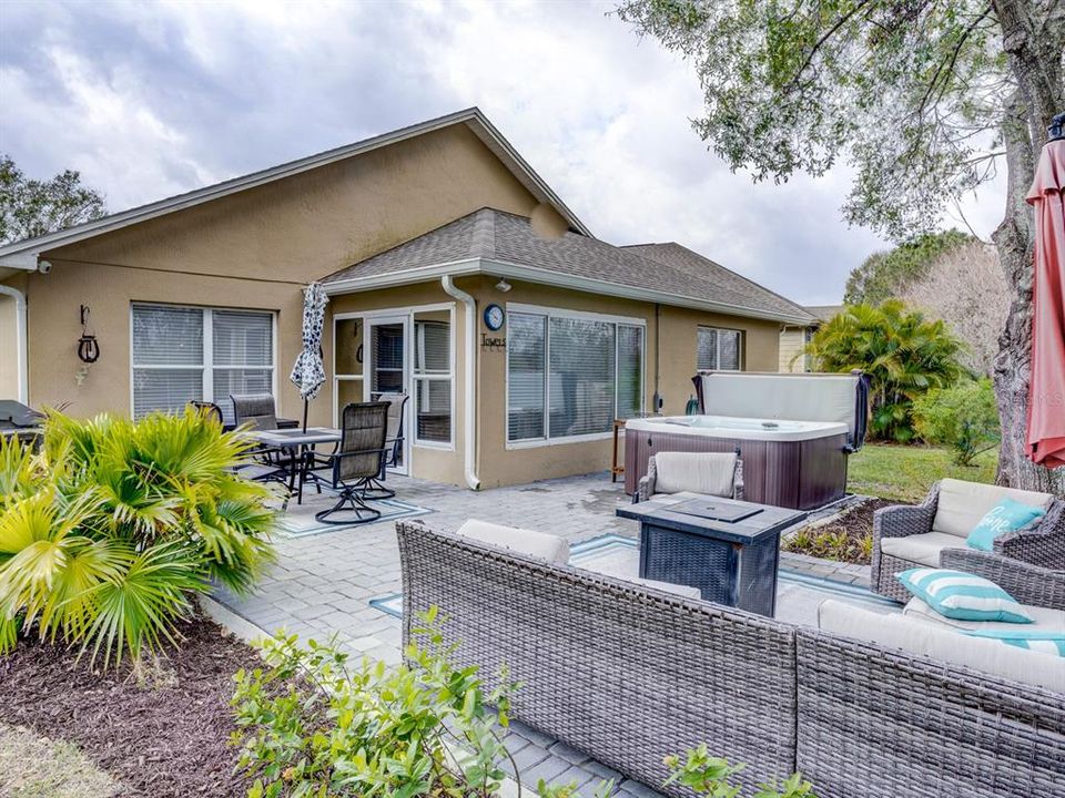 Back yard with a hot tub and serene quiet environment.