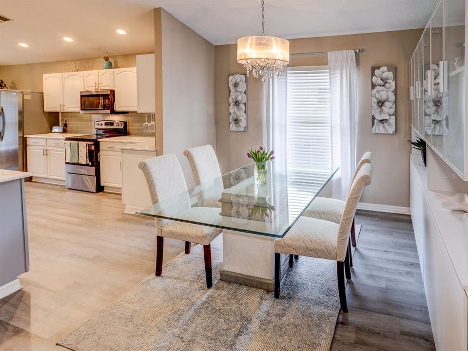 Dining room with view of the kitchen.