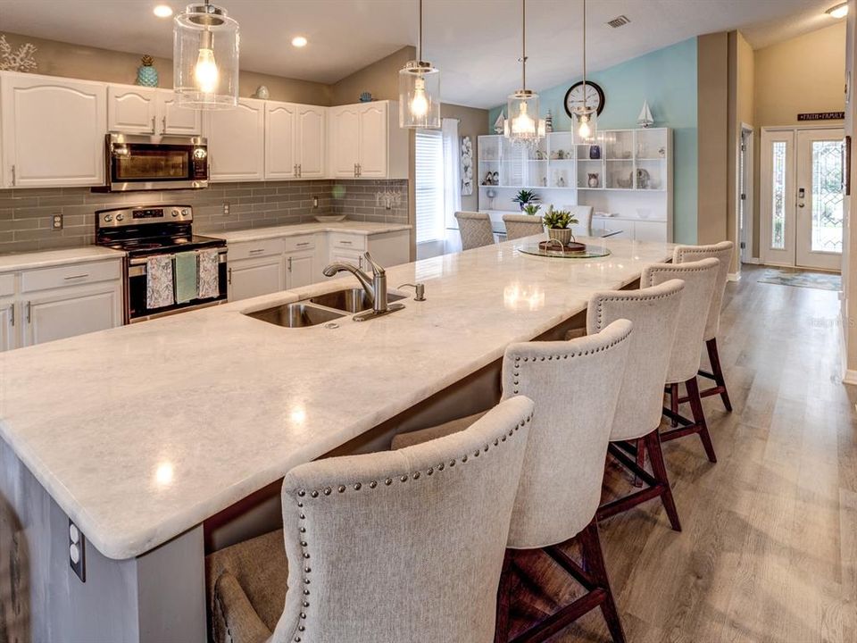 Kitchen area and view of the front door.