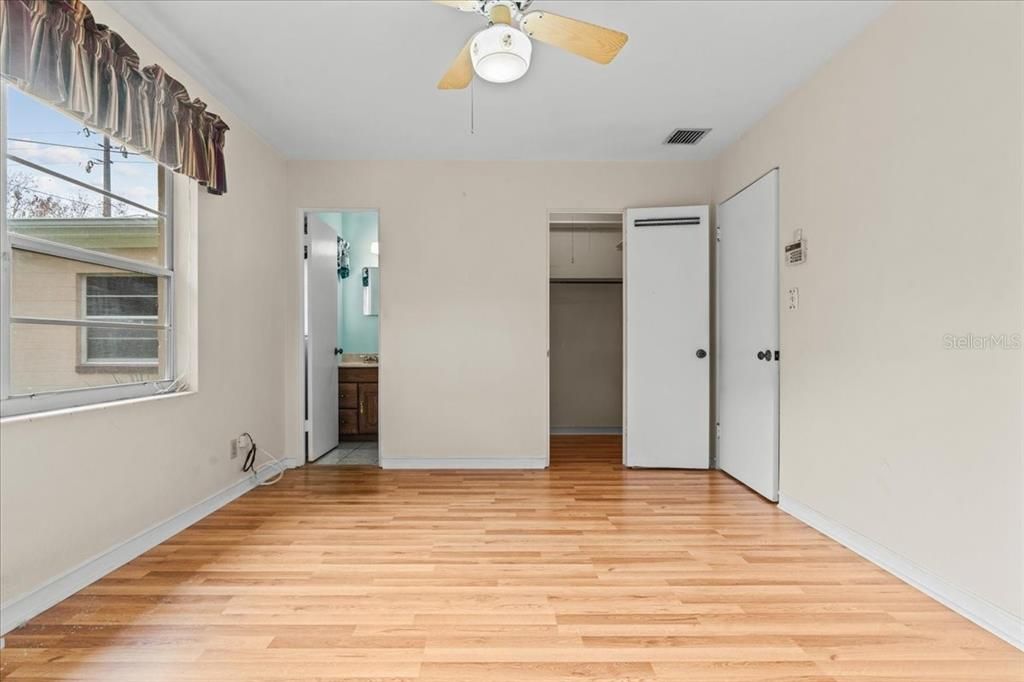 Primary Bedroom with half bath