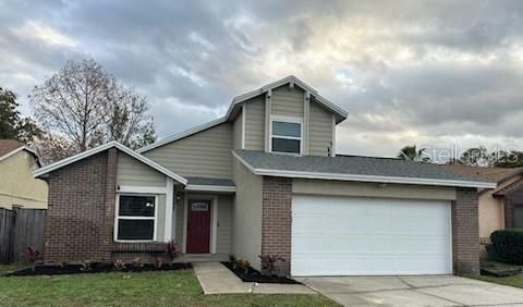 Contemporary home in Alafaya Woods w/ recent paint a d a new roof