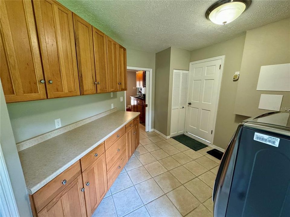 Laundry Room with Built Ins and Half Bath