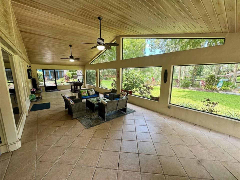 Large Screened Back Porch on Home