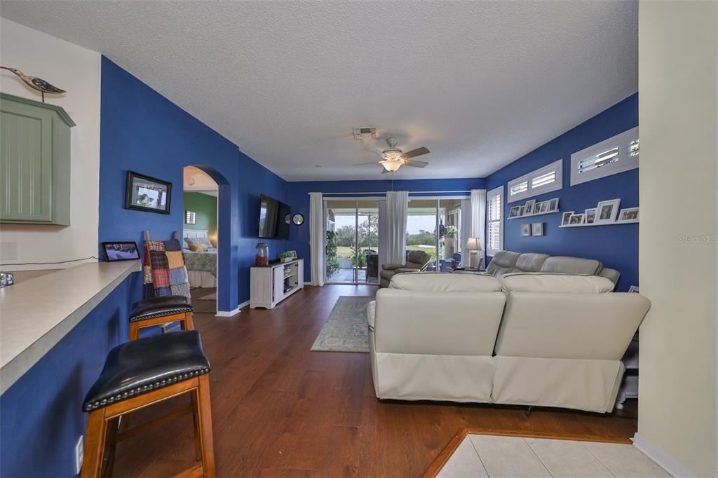 Waling into the condo, you immediately see the water, golf course and conservation area.  Living Room has an open floor plan with access to the lanai, dining room, and kitchen.