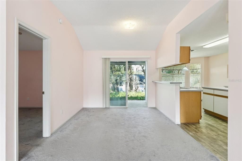 Dining Room, Sliding Door to Back Porch, & Kitchen