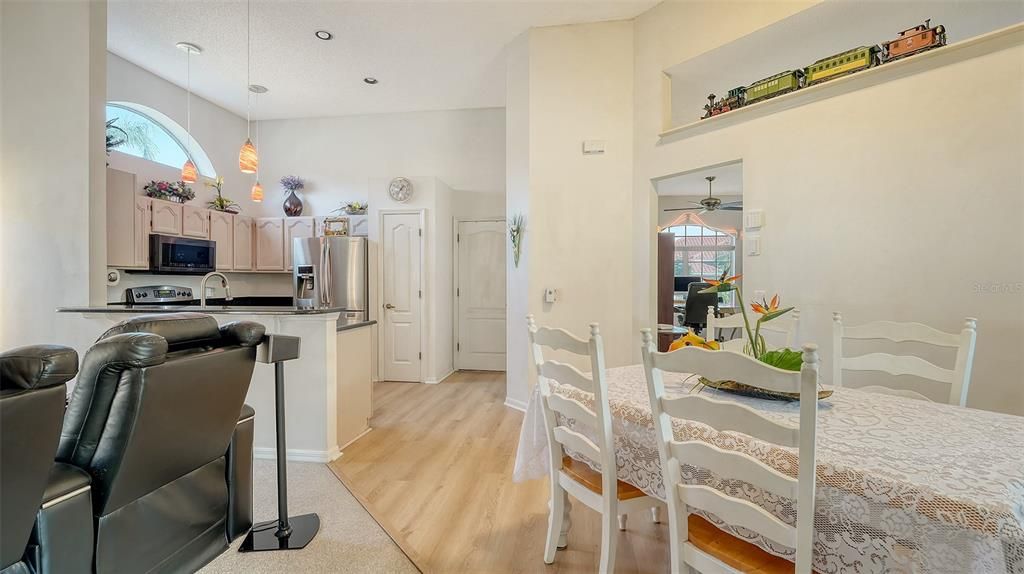 View into kitchen from eating area.