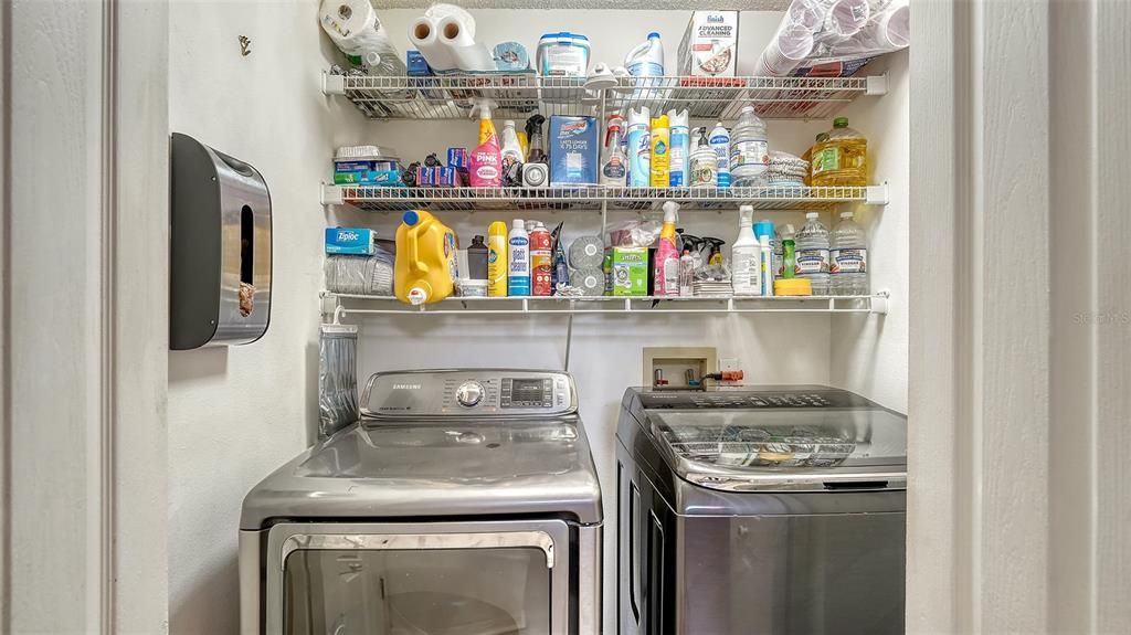 Laundry closet off kitchen.