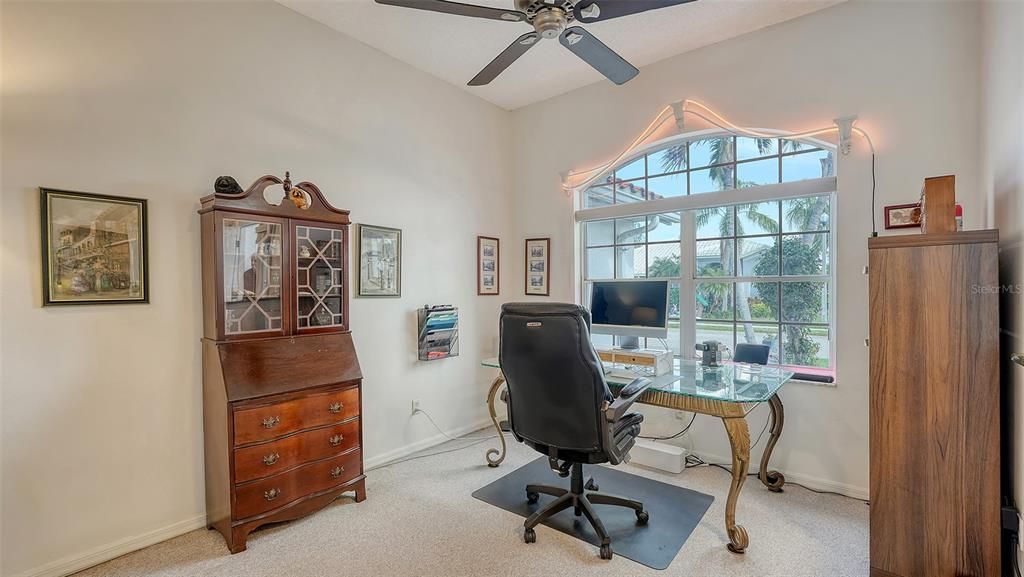 Dining area is being used as office/den.