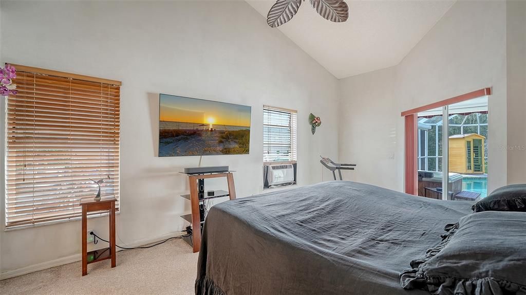 Master bedroom w. carpet flooring