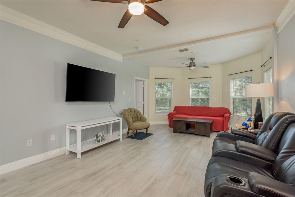 Tall ceilings throughout with crown molding.