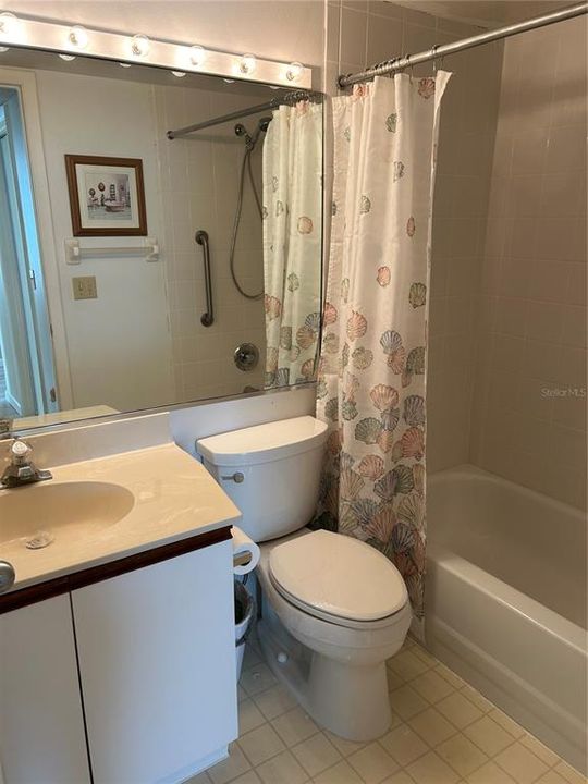 Guest bathroom with tub