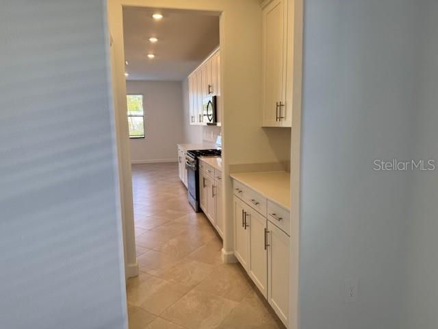 Butler Pantry between Dining and Kitchen