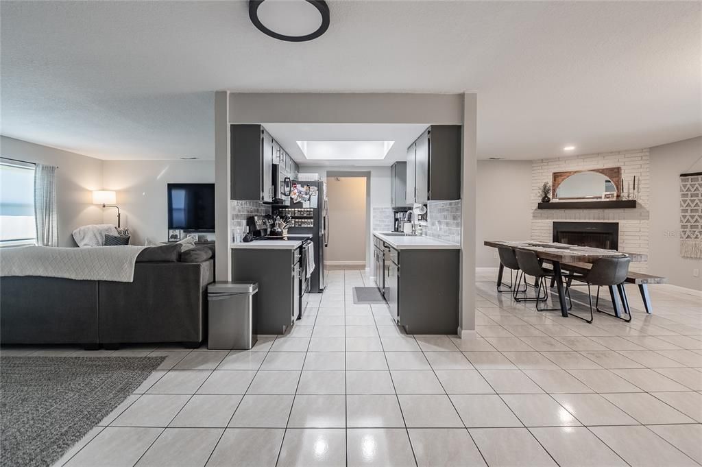 Open ended Galley Kitchen flows into the hallway with 2 bedrooms and a hall bath.