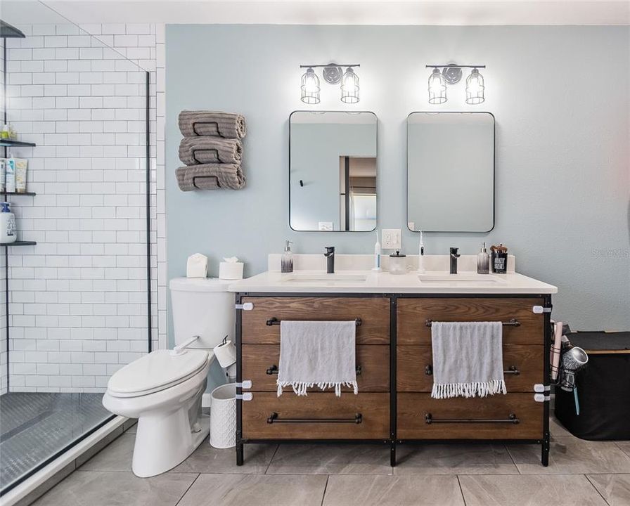 Primary bath with dual sinks.