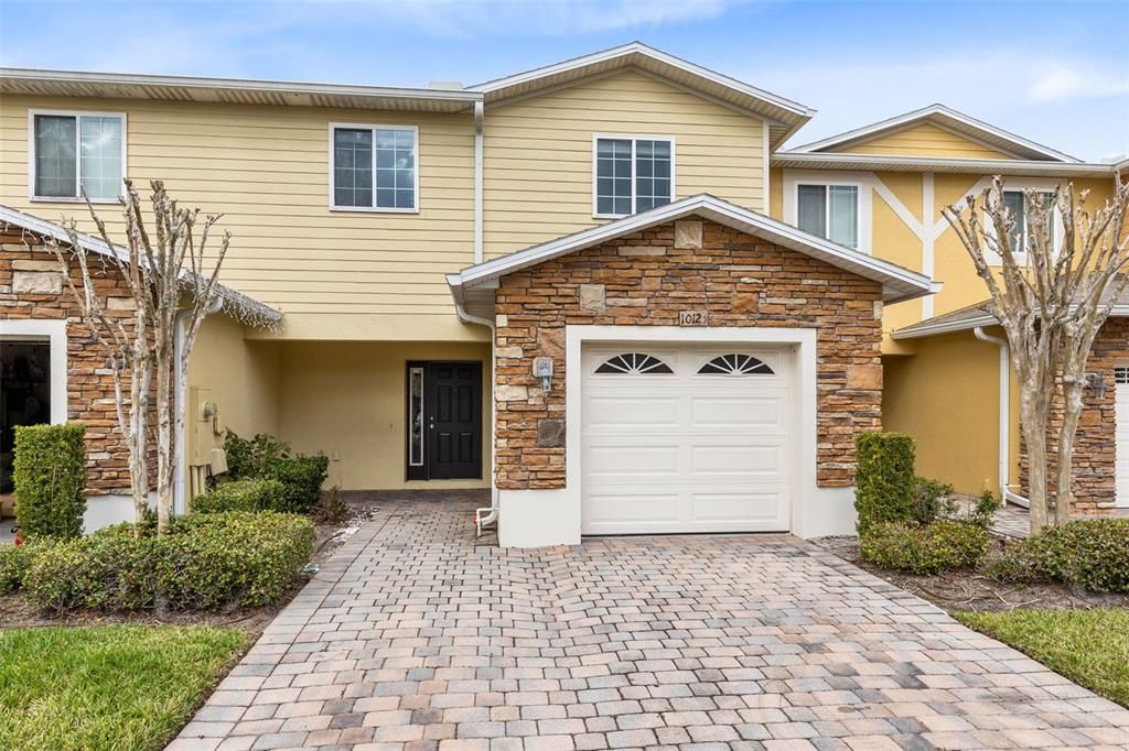 Beautifully Updated Townhouse with a Brand New Roof (2024), New Luxury Vinyl Plank Flooring (2024) and New Interior Paint (2024) in the EXTREMELY SOUGHT AFTER Community of The Villas at Cypress Springs!