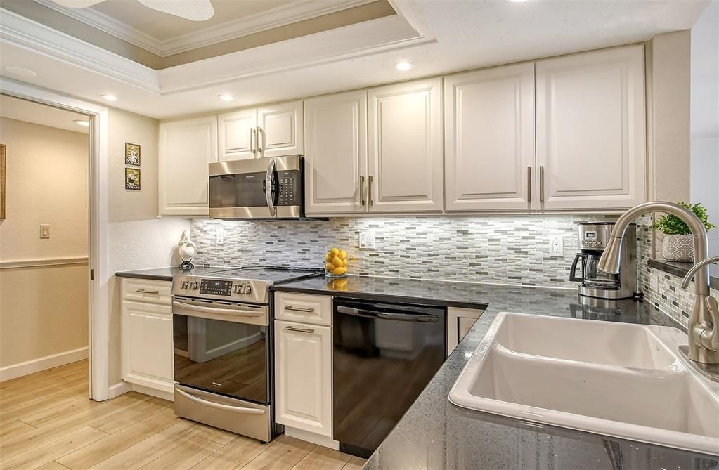 quartz counters and mosaic back splash