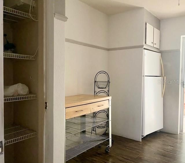 Breakfast nook area and pantry in kitchen