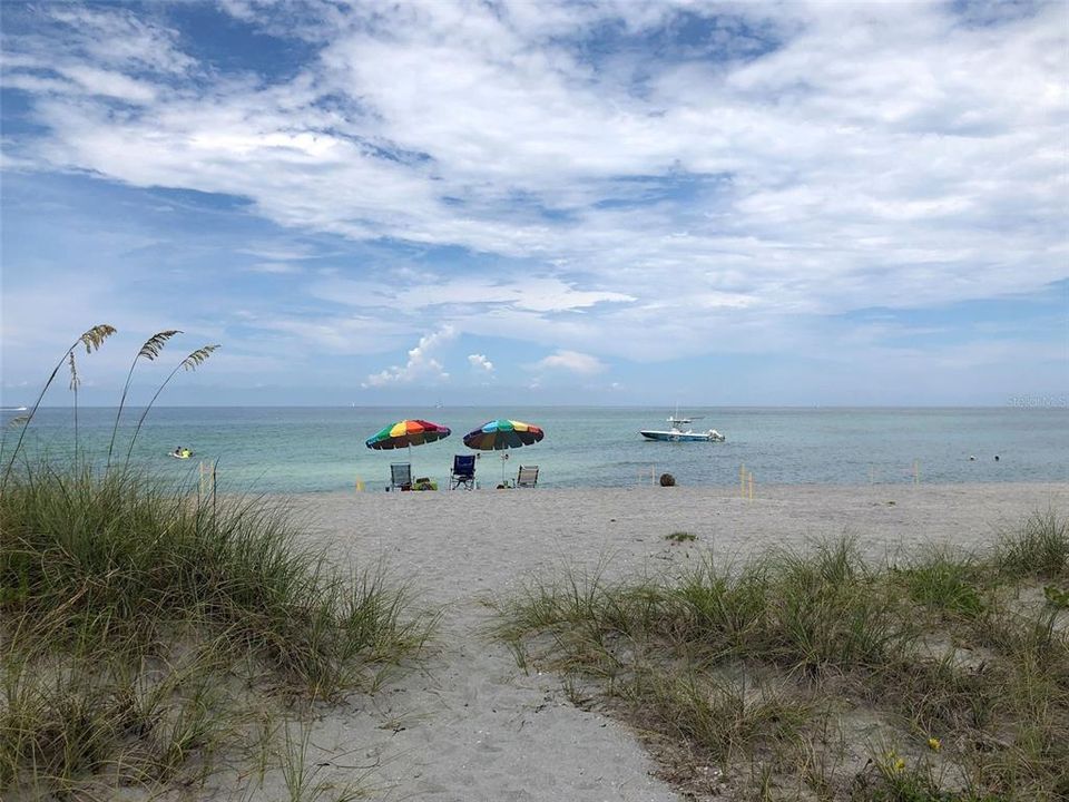 There you are - Under your Sunbrella watching the world drift by.