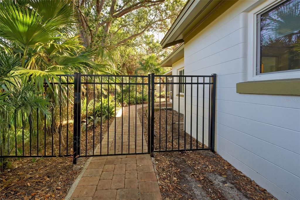 Gated entry to back yard on both sides!