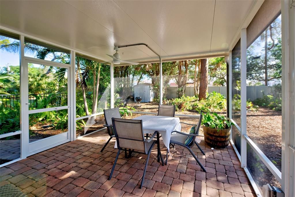 Attached Screened Room for your Alfresco Dining or how about a Garden Party with the neighbors?