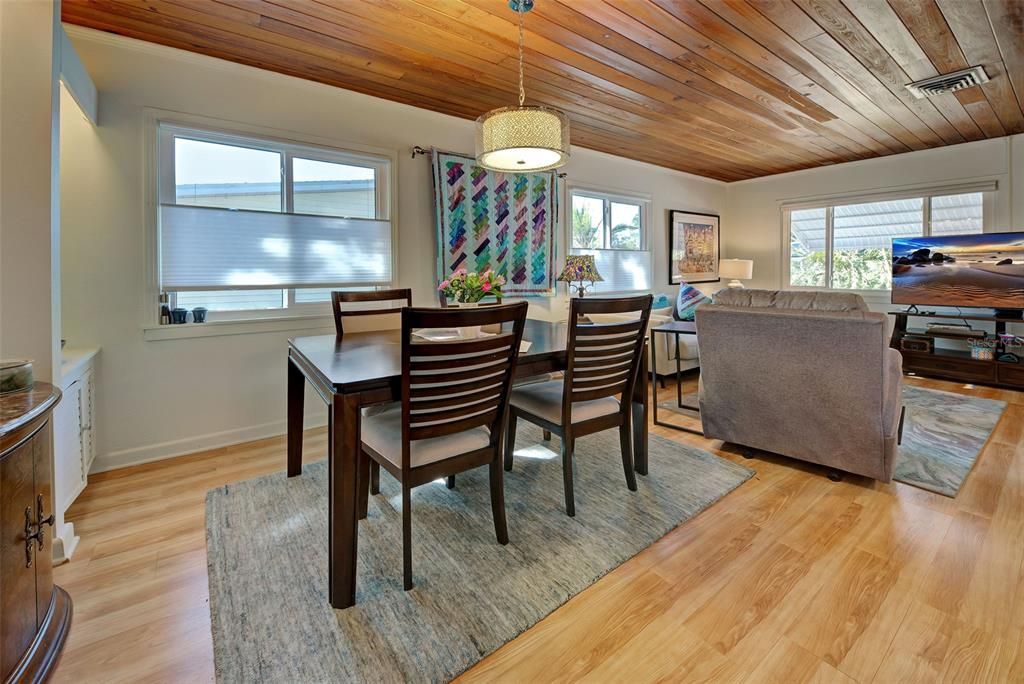 These Pine ceilings add a natural warm and inviting feel to this home.