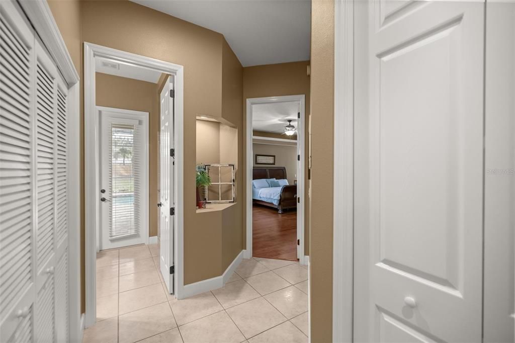 Hallway to Primary Bedroom and Pool Bath