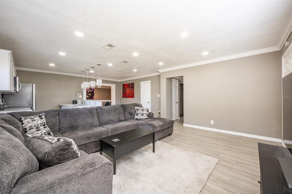 EAST VIEW OF LIVING ROOM/TOWARDS BEDROMS