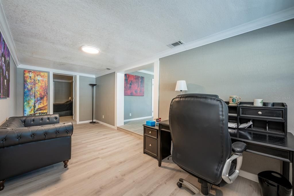 WIDE VIEW OF HALLWAY FACING PRIMARY BEDROOM